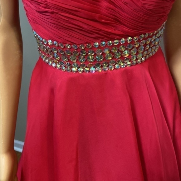 Size 0 blush prom dress worn once. Its a knee length dress has a sash with it - Picture 4 of 7